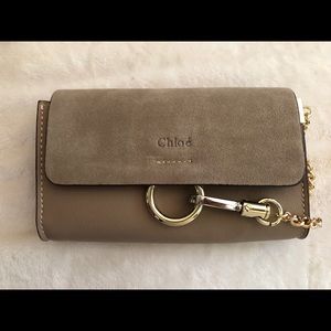 Chloe clutch with shoulder strap.